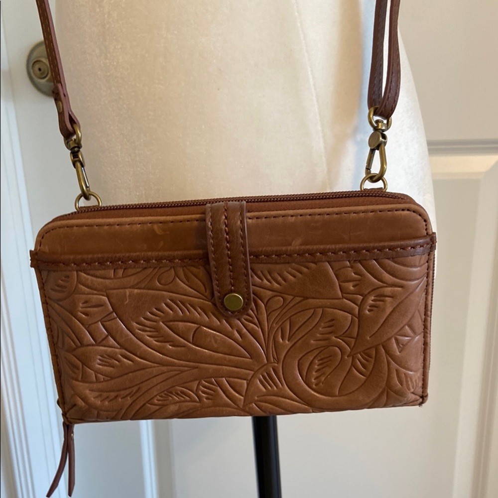 The Sak Brown Embossed Leather Crossbody/Wristlet Wallet. New and Never Used.